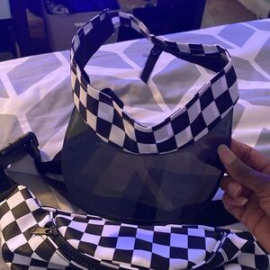 Black and white checkered Fanny pack and sun visor hat